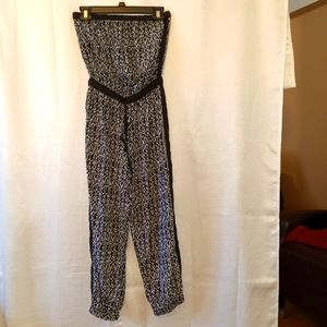 Jumpsuit elasticized top waist and ankle size med/lrg black and white airy